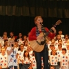 Trish singing "Thank a Soldier" with first graders